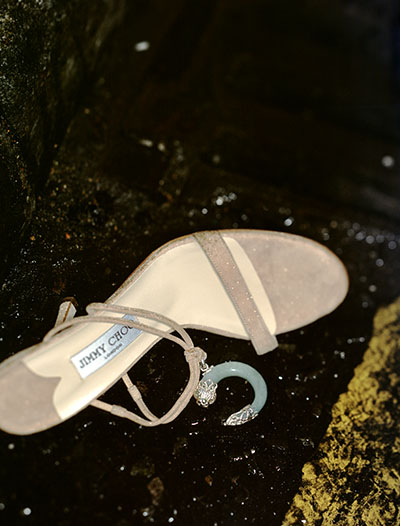 Jimmy Choo shoe in gutter – Photograph by George Ong