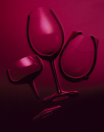Three red wine glasses – Photograph by George Ong
