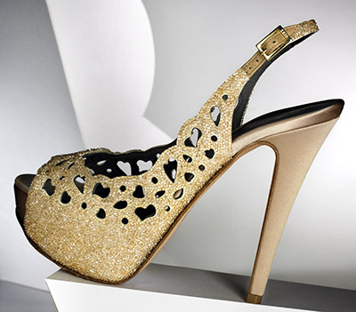 Ladies gold glitter shoe – Photograph by George Ong